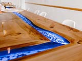 Macrocarpa slab benchtop with resin river, made by Alba Interiors